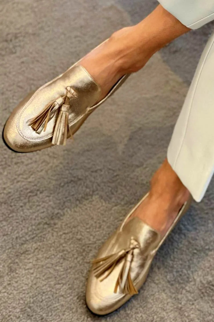Mocasines brillantes metalizados Oro con costuras a la vista