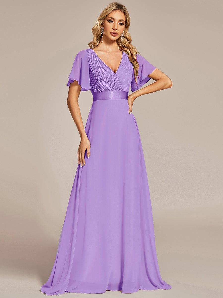 Marga | Vestido de dama de honor largo con corte imperio y mangas cortas con volantes