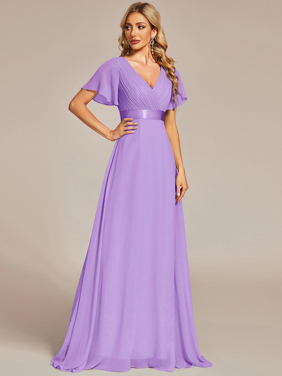 Marga | Vestido de dama de honor largo con corte imperio y mangas cortas con volantes