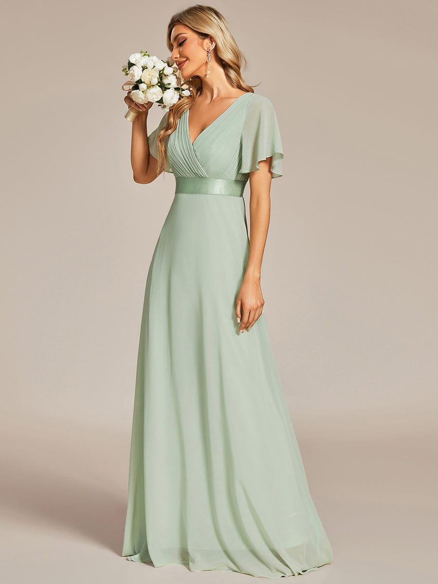 Marga | Vestido de dama de honor largo con corte imperio y mangas cortas con volantes