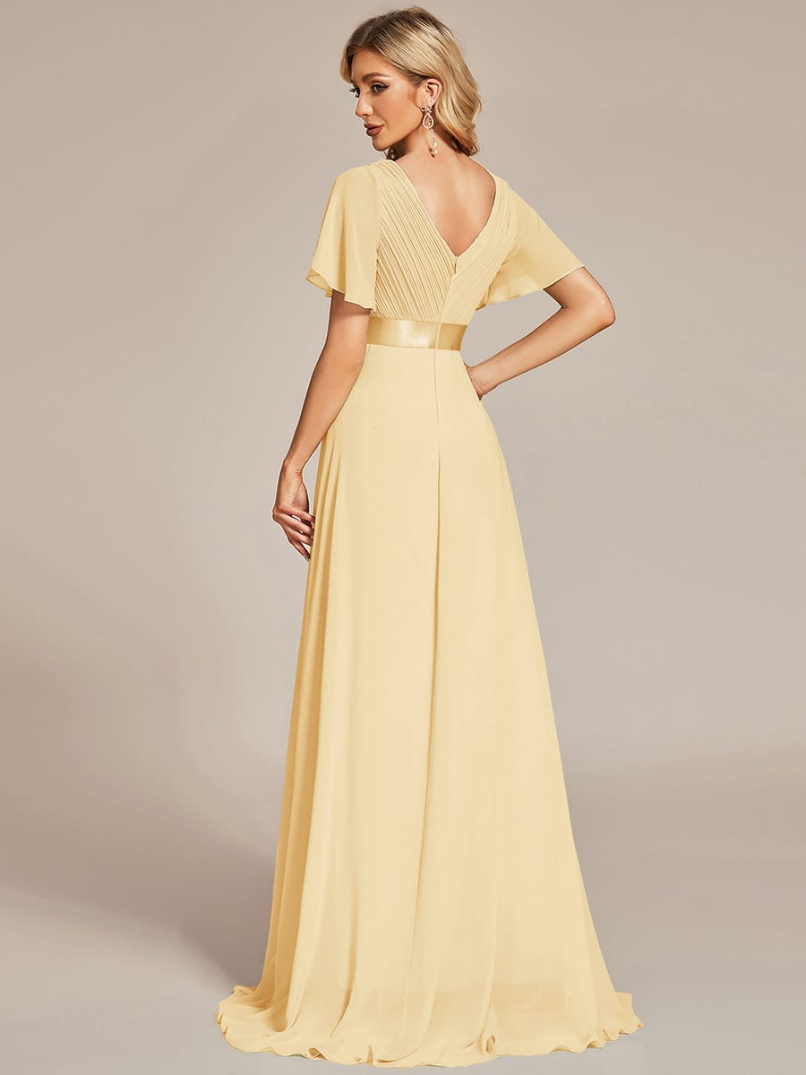 Marga | Vestido de dama de honor largo con corte imperio y mangas cortas con volantes
