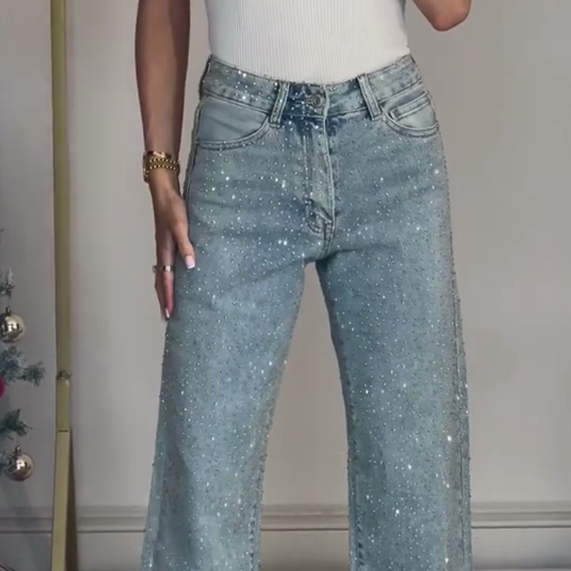 AFRICA | VAQUEROS DE PIERNA RECTA CON STRASS